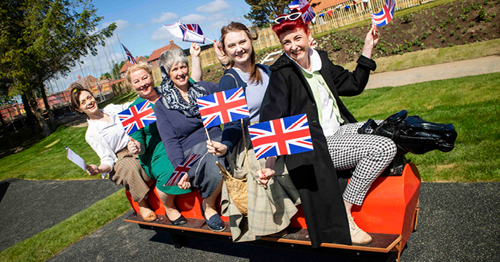 Beamish Museum staff and volunteers celebrate the opening of Coronation Park at the museum